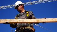 Laborer with fall protection
